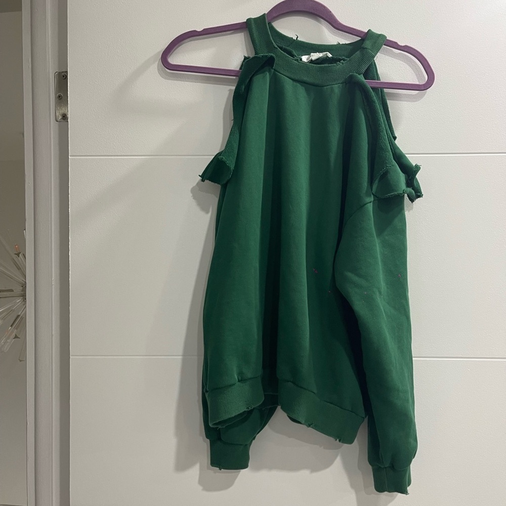 Bought it in Bloomingdale’s New Never use it in Green Size Small
